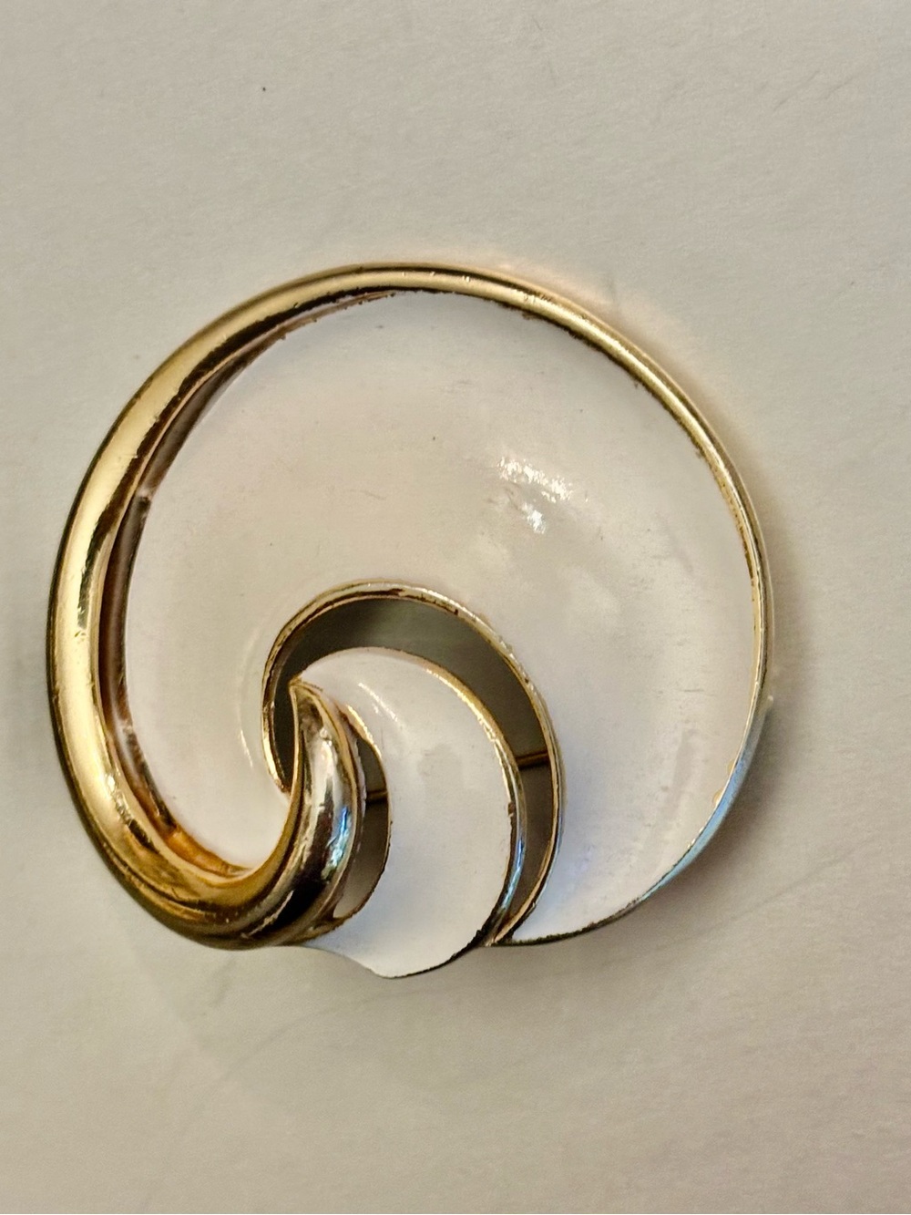 Trifari White and Gold Swirl Enamel Brooch